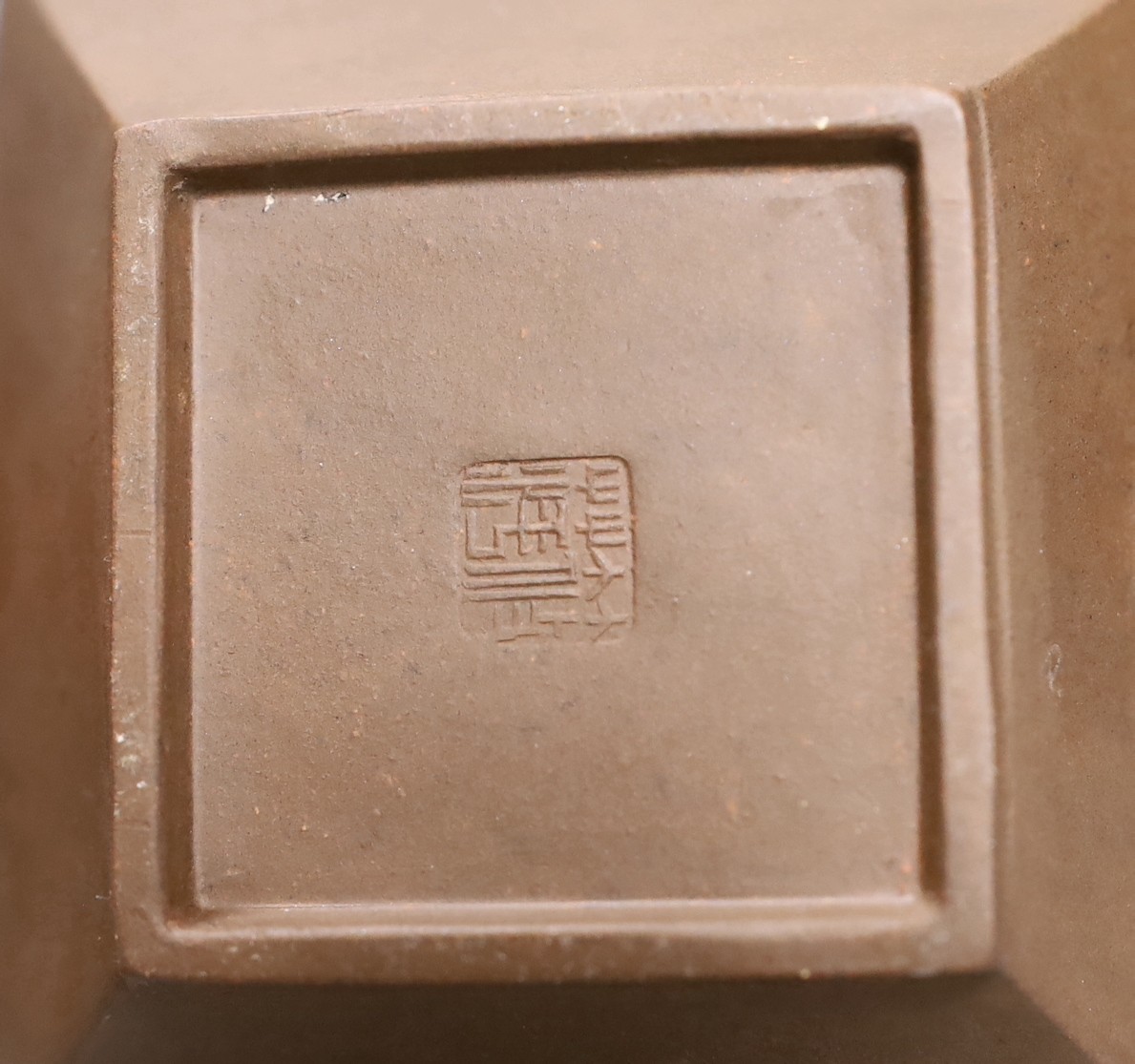 A Chinese Yixing rectangular teapot and three other Yixing teapots (4), Tallest 12 cms high